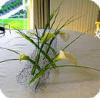 Creatief bloemstuk als tafeldecoratie - bloemstuk als tafelversiering maken met calla en gaas - creatief bloemschikken