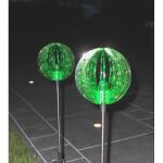 Duo van groene solarbollen met grondpin